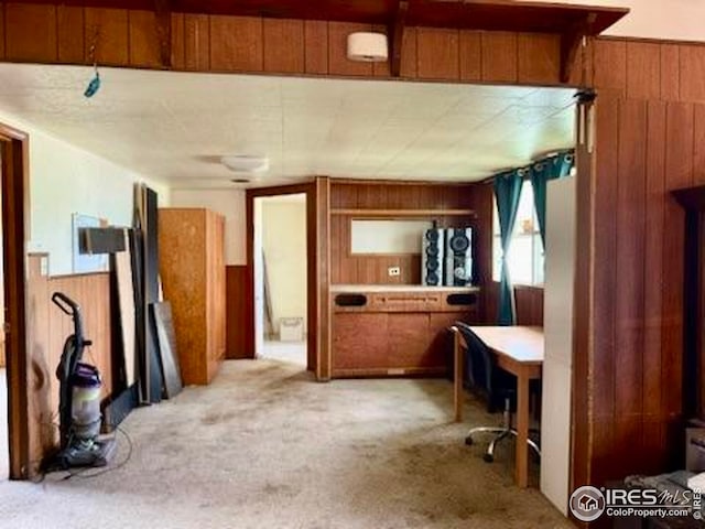 230 W Chase St, Haxtun, CO 80731 - office area featuring wooden walls and light colored carpet