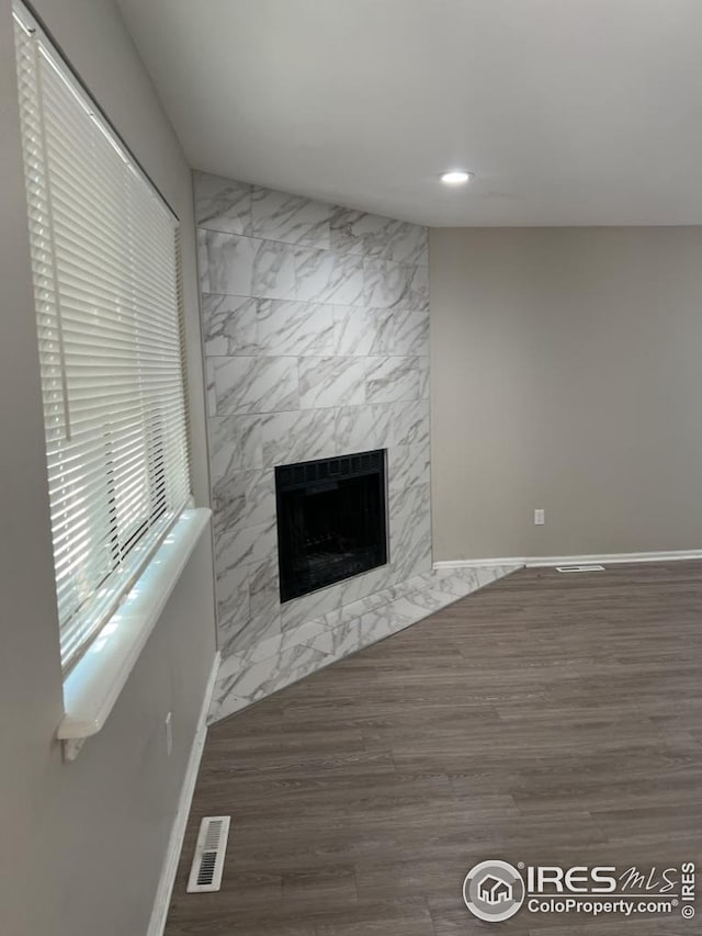 2005 Goss St, Boulder, CO 80302 - unfurnished living room with a fireplace, wood finished floors, baseboards, and recessed lighting