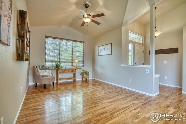 2069 Vineyard Ct, Windsor, CO 80550 - sitting room with plenty of natural light, wood finished floors, vaulted ceiling, ceiling fan, and baseboards