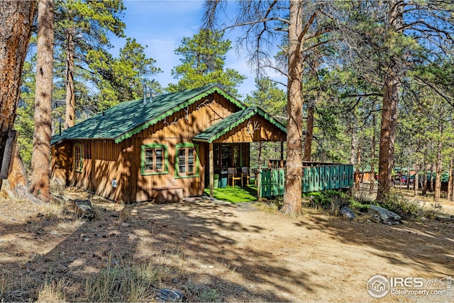 2450 Eagle Cliff Rd, Estes Park, CO 80517 - view of front of house featuring board and batten siding