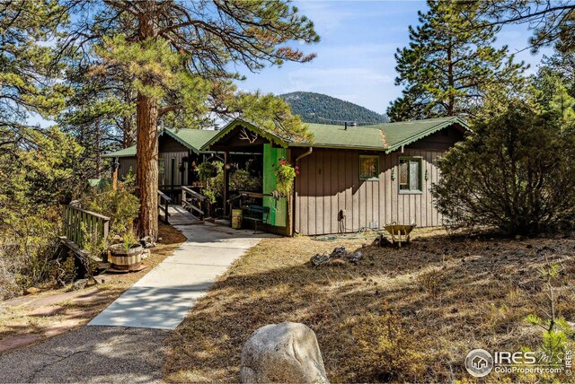 2450 Eagle Cliff Rd, Estes Park, CO 80517 - view of front of home featuring a mountain view
