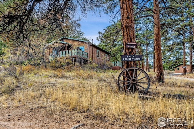 2450 Eagle Cliff Rd, Estes Park, CO 80517 - view of yard with a wooden deck