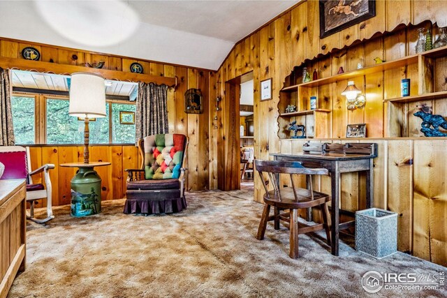2450 Eagle Cliff Rd, Estes Park, CO 80517 - carpeted dining room featuring wood walls and vaulted ceiling