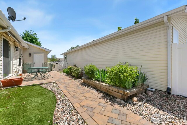 955 Sunchase Dr, Fort Collins, CO 80524 - view of patio / terrace with fence