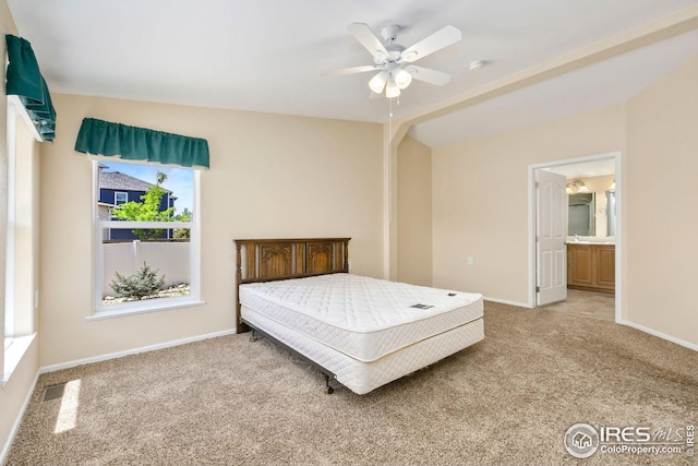 955 Sunchase Dr, Fort Collins, CO 80524 - bedroom with light carpet, baseboards, a ceiling fan, and connected bathroom