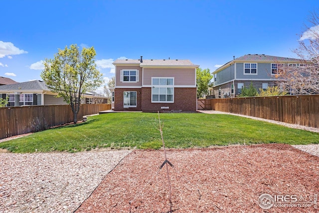 rear view of property featuring brick siding