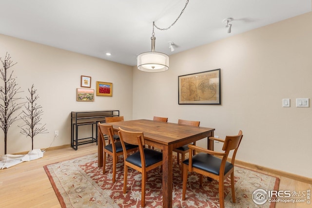 1140 Portland Pl Unit 207, Boulder, CO 80304 - dining area featuring light wood-style floors, recessed lighting, and baseboards