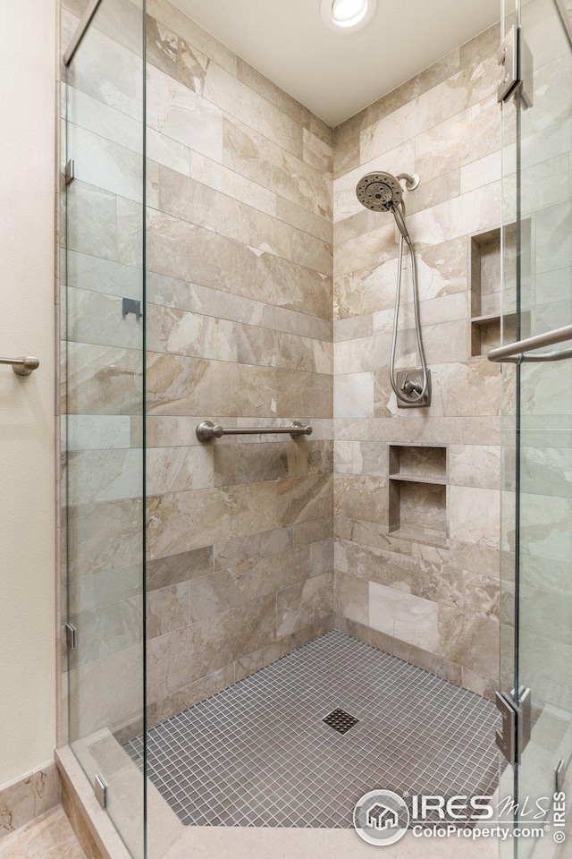 1140 Portland Pl Unit 207, Boulder, CO 80304 - full bathroom with a stall shower and baseboards