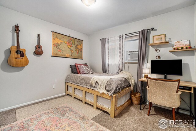 1001 Strachan Dr Unit 24, Fort Collins, CO 80525 - carpeted bedroom featuring baseboards and cooling unit
