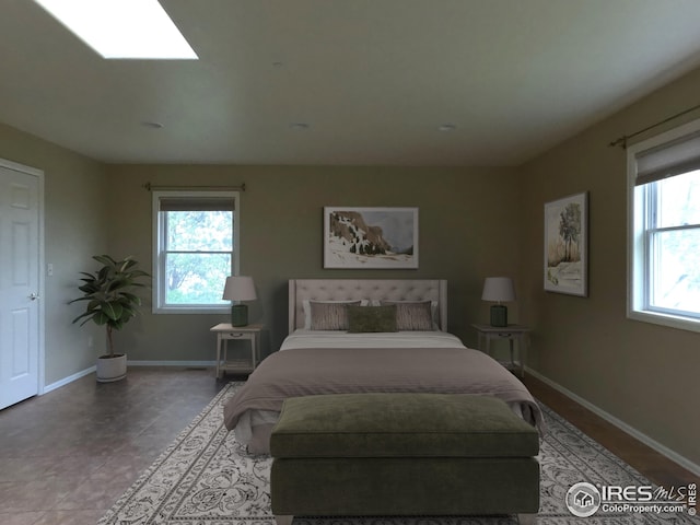 22198 County Road 25, Fort Morgan, CO 80701 - tiled bedroom with baseboards