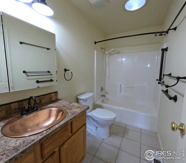 22198 County Road 25, Fort Morgan, CO 80701 - bathroom with tile patterned flooring, vanity, and washtub / shower combination