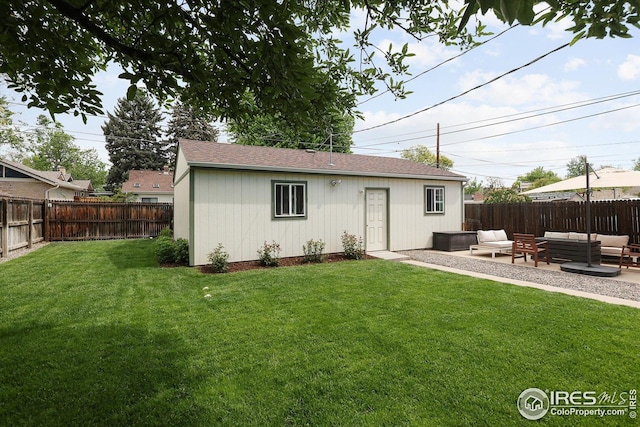 3039 W Denver Pl, Denver, CO 80211 - back of property with an outdoor hangout area, a patio, an outdoor structure, and roof with shingles