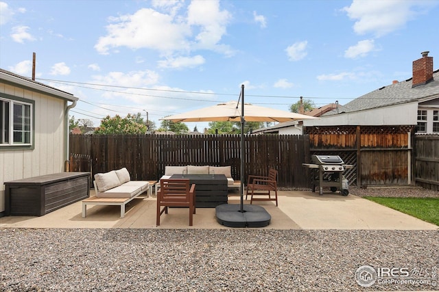 3039 W Denver Pl, Denver, CO 80211 - fenced backyard featuring area for grilling, outdoor lounge area, and a patio