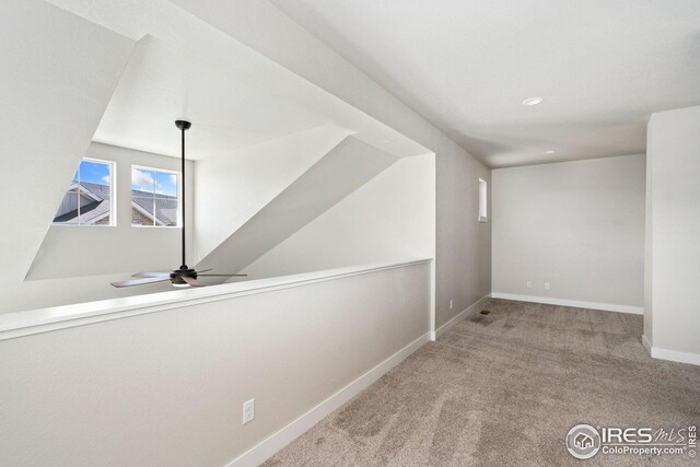 2497 Trio Falls Dr, Loveland, CO 80538 - corridor featuring carpet floors, baseboards, and recessed lighting