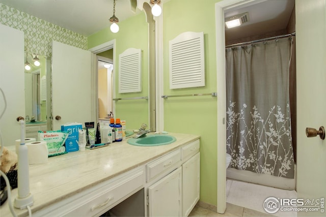 2620 Lloyd Cir, Boulder, CO 80304 - bathroom featuring vanity, tile patterned floors, and toilet