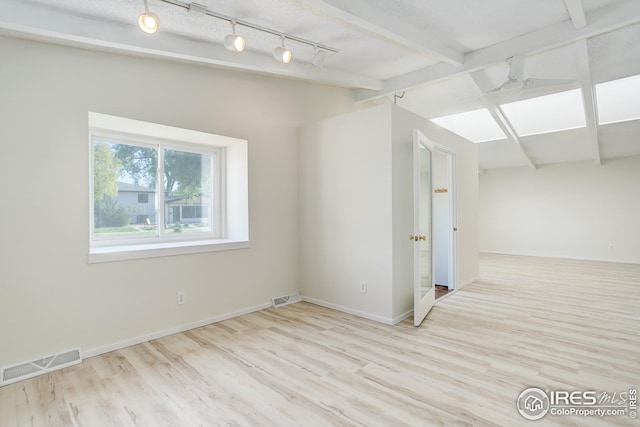 2620 Lloyd Cir, Boulder, CO 80304 - unfurnished room featuring wood finished floors, baseboards, and rail lighting