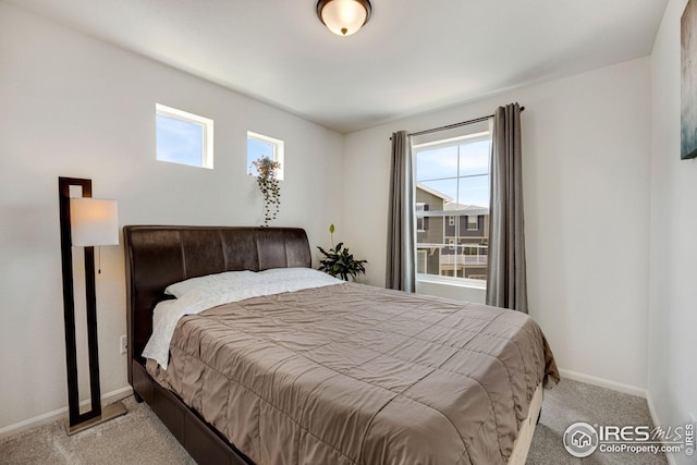 542 Highlands Cir, Erie, CO 80516 - bedroom with baseboards and light carpet