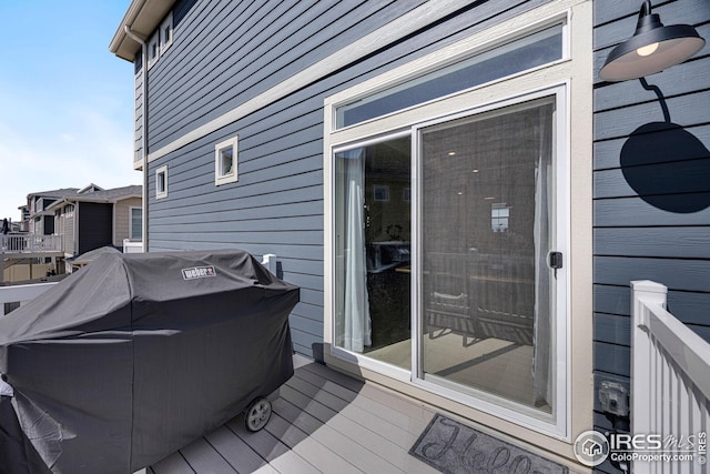 542 Highlands Cir, Erie, CO 80516 - wooden terrace with grilling area