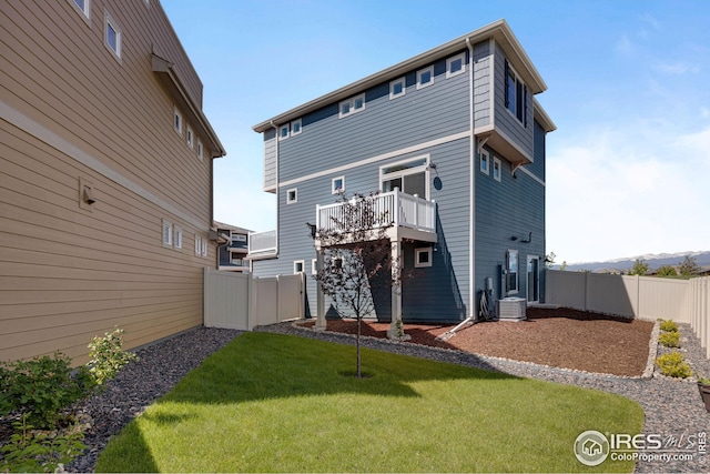 542 Highlands Cir, Erie, CO 80516 - rear view of house with central AC