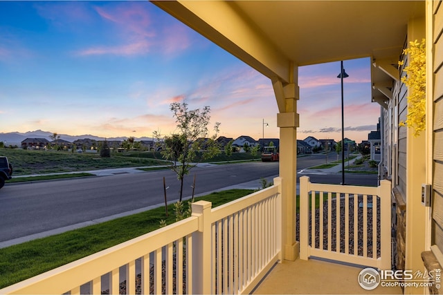 542 Highlands Cir, Erie, CO 80516 - balcony at dusk with a residential view
