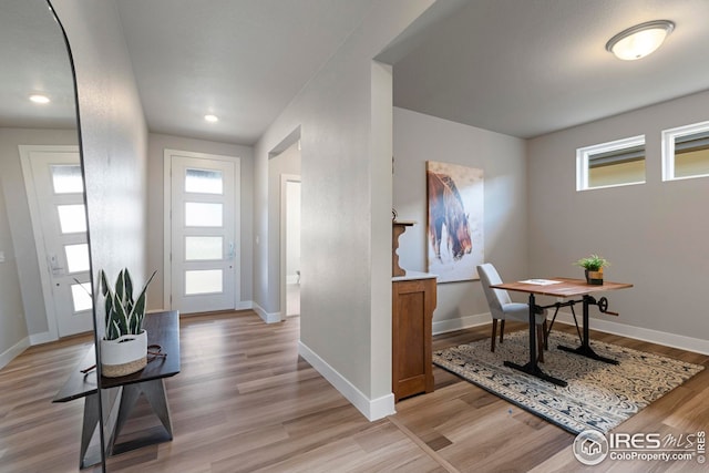 6752 Castello St, Timnath, CO 80547 - entrance foyer with light wood-style floors, plenty of natural light, and baseboards