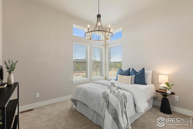 6752 Castello St, Timnath, CO 80547 - bedroom with a chandelier, carpet, and baseboards