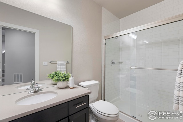 6752 Castello St, Timnath, CO 80547 - full bath featuring toilet, a shower stall, and vanity