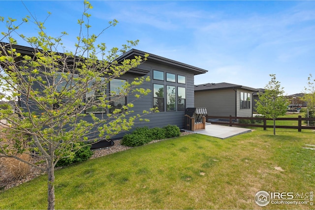 6752 Castello St, Timnath, CO 80547 - rear view of property with a patio area