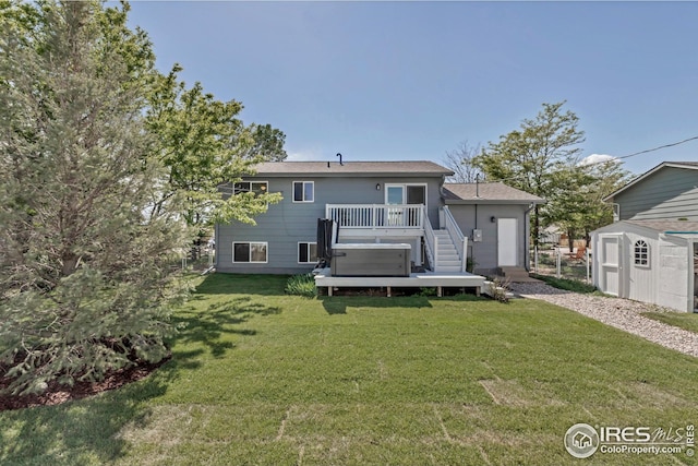 1006 4th St, Pierce, CO 80650 - back of house featuring a deck and a lawn