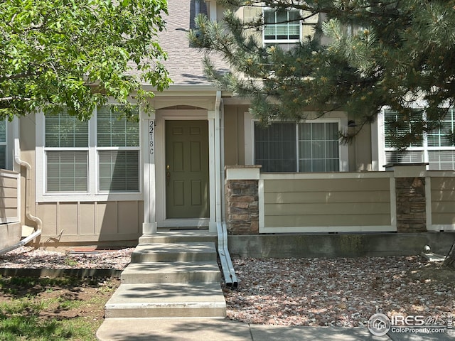 2218 Stetson Creek Dr Unit C, Fort Collins, CO 80528 - entrance to property with stone siding