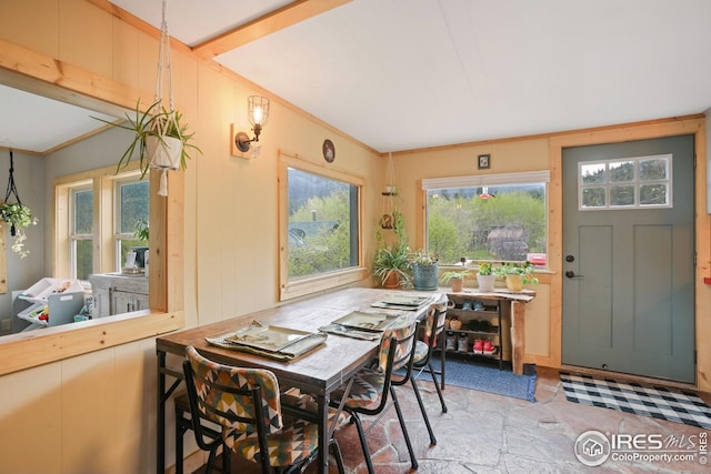 175 Ironclad View Rd, Allenspark, CO 80510 - dining room featuring light stone finish floors and crown molding