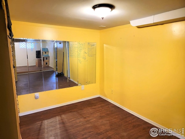 402 N Washington Ave, Fleming, CO 80728 - empty room featuring wood finished floors and baseboards