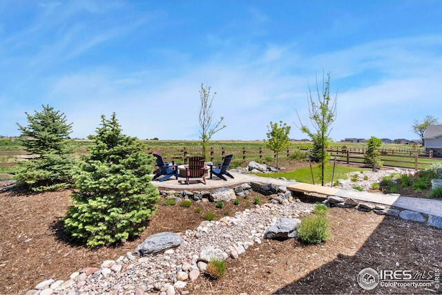 1030 Larimer Ridge Pkwy, Timnath, CO 80547 - view of yard featuring a patio area and an outdoor fire pit
