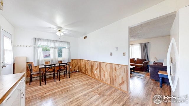 8208 Peakview Dr, Fort Collins, CO 80528 - dining space with a ceiling fan and light wood-style floors