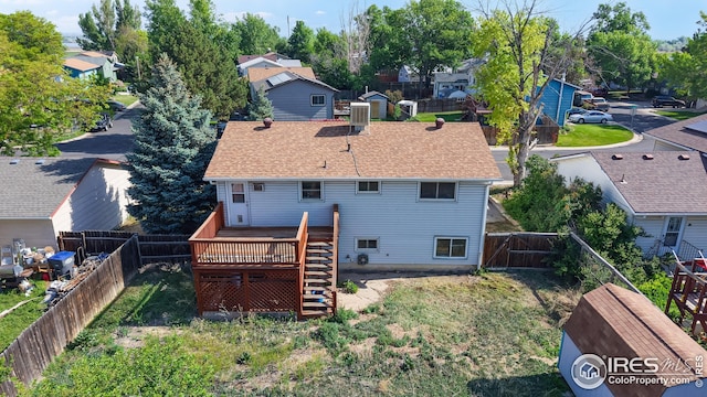 8208 Peakview Dr, Fort Collins, CO 80528 - back of house featuring a deck, stairs, and a residential view