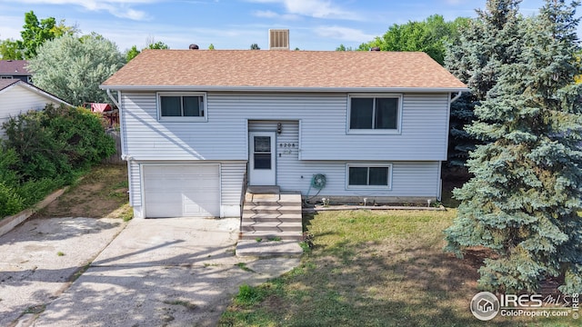 8208 Peakview Dr, Fort Collins, CO 80528 - raised ranch featuring an attached garage and concrete driveway