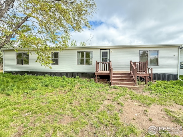 306 E Arapahoe St, Fleming, CO 80728 - back of house featuring a wooden deck