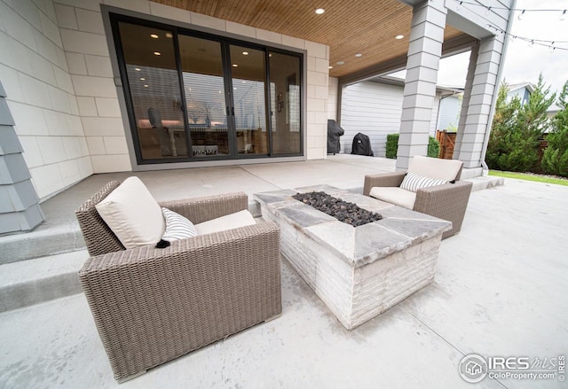 9415 E 58th Dr, Denver, CO 80238 - view of patio with a fire pit