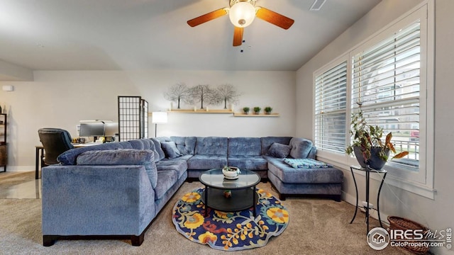 4642 Hahns Peak Dr Unit 101, Loveland, CO 80538 - living area featuring carpet flooring, healthy amount of natural light, and ceiling fan