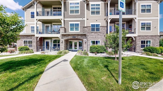 4642 Hahns Peak Dr Unit 101, Loveland, CO 80538 - view of apartment building / complex