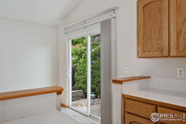 474 Radiant Dr, Loveland, CO 80538 - doorway to outside with vaulted ceiling