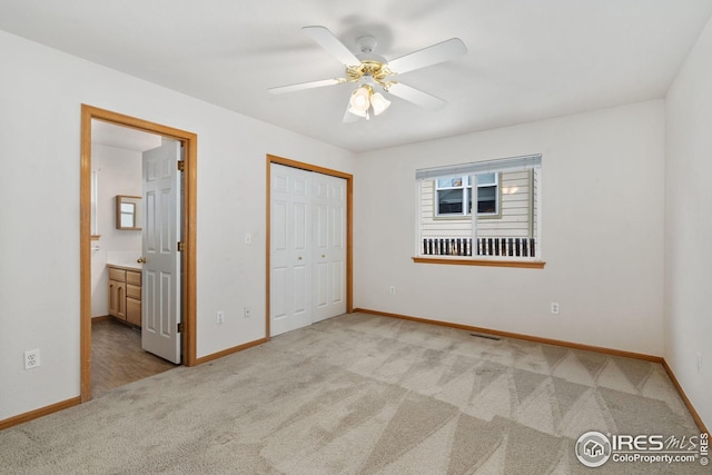 474 Radiant Dr, Loveland, CO 80538 - unfurnished bedroom featuring carpet floors, baseboards, and ensuite bathroom