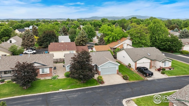 474 Radiant Dr, Loveland, CO 80538 - aerial perspective of suburban area with mountains