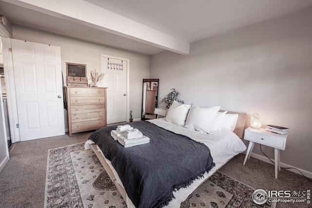 2636 Juniper Ave Unit 39-2, Boulder, CO 80304 - bedroom featuring carpet, beam ceiling, and baseboards