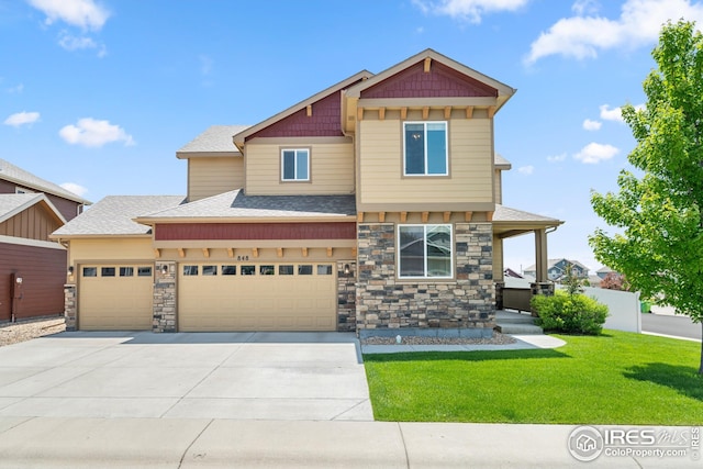 848 Shirttail Peak Dr, Windsor, CO 80550 - craftsman house with a front lawn, stone siding, concrete driveway, roof with shingles, and a garage