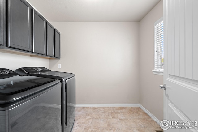 848 Shirttail Peak Dr, Windsor, CO 80550 - washroom with independent washer and dryer, healthy amount of natural light, baseboards, and cabinet space
