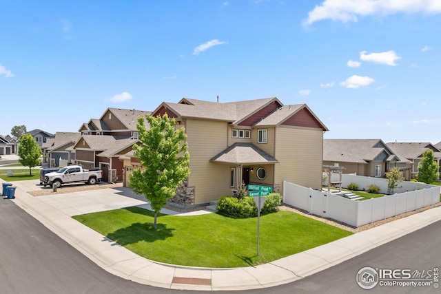 848 Shirttail Peak Dr, Windsor, CO 80550 - view of front of property with a residential view, driveway, and a gate