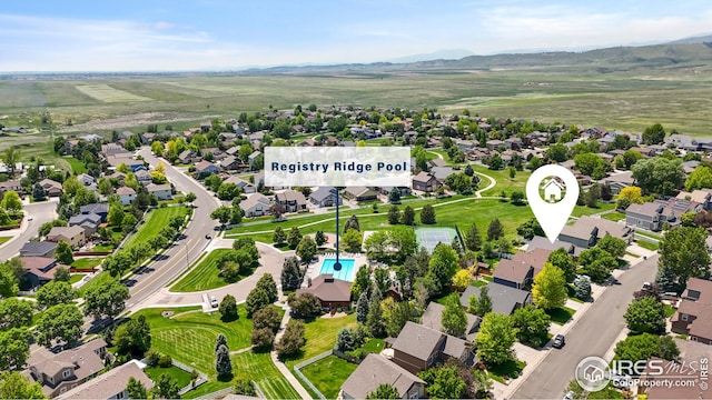 1427 Reeves Dr, Fort Collins, CO 80526 - aerial view of residential area featuring a mountainous background