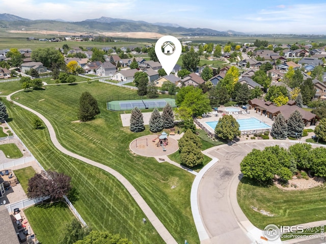 1427 Reeves Dr, Fort Collins, CO 80526 - aerial perspective of suburban area featuring mountains and a pool