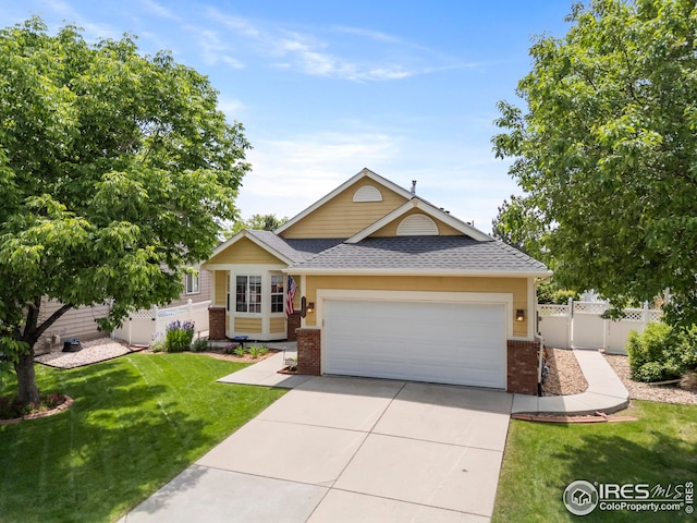 1427 Reeves Dr, Fort Collins, CO 80526 - view of front of property featuring brick siding, an attached garage, concrete driveway, and roof with shingles